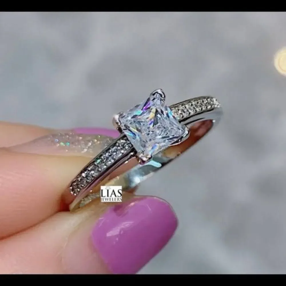New 18k white gold engagement ring